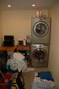 The laundry room. We stacked the W/D to save space as it is not a huge laundry room. There are some old cabinets and a micro etc in here now - just temporarily. The plan is to complete the kitchen and bath and then come back and install cabs in this room.